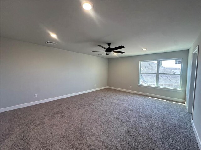 1221 SW 141st St, Oklahoma City, OK 73170 - spare room with carpet flooring, baseboards, and a ceiling fan