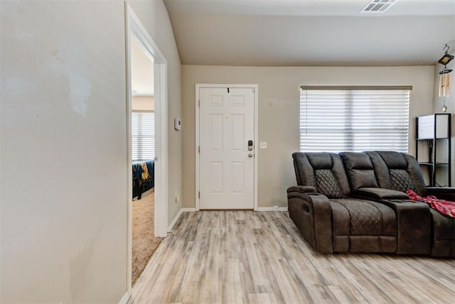 1641 Tumbleweed Way, El Reno, OK 73036 - living room featuring light wood finished floors, baseboards, and visible vents