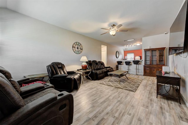 1641 Tumbleweed Way, El Reno, OK 73036 - living area featuring light wood finished floors and ceiling fan