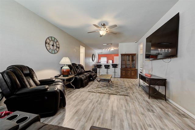 1641 Tumbleweed Way, El Reno, OK 73036 - living room with baseboards, ceiling fan, and wood finished floors