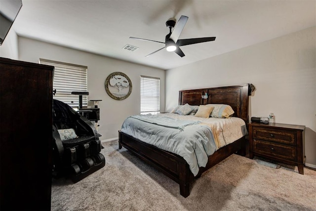 1641 Tumbleweed Way, El Reno, OK 73036 - carpeted bedroom featuring ceiling fan, baseboards, and visible vents