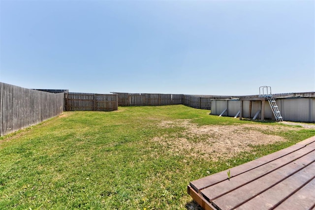 1641 Tumbleweed Way, El Reno, OK 73036 - view of yard featuring a fenced backyard and a fenced in pool