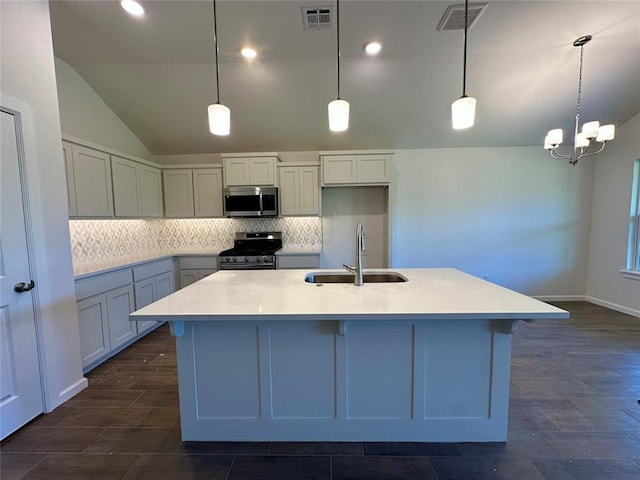8605 NW 76th St, Oklahoma City, OK 73132 - kitchen with stainless steel appliances, a sink, vaulted ceiling, decorative backsplash, and a chandelier