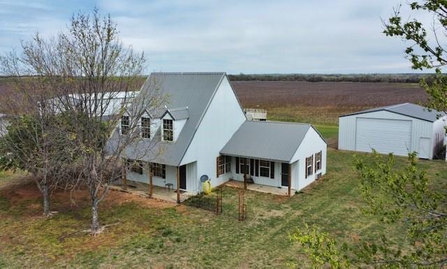713 Whispering Water Dr, Fort Cobb, OK 73038 - exterior space featuring a yard, a garage, and an outdoor structure