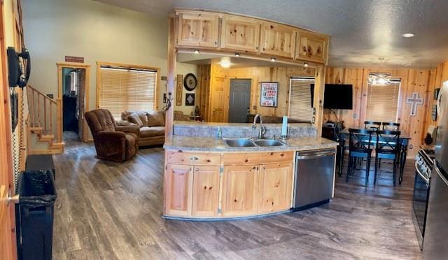 713 Whispering Water Dr, Fort Cobb, OK 73038 - kitchen featuring light brown cabinets, open floor plan, dark wood-type flooring, dishwasher, and a sink