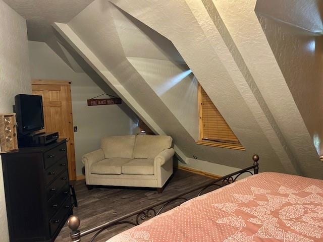 713 Whispering Water Dr, Fort Cobb, OK 73038 - bedroom featuring vaulted ceiling and wood finished floors