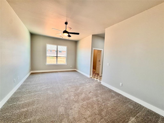 10116 NW 100th St, Yukon, OK 73099 - empty room with carpet flooring and ceiling fan