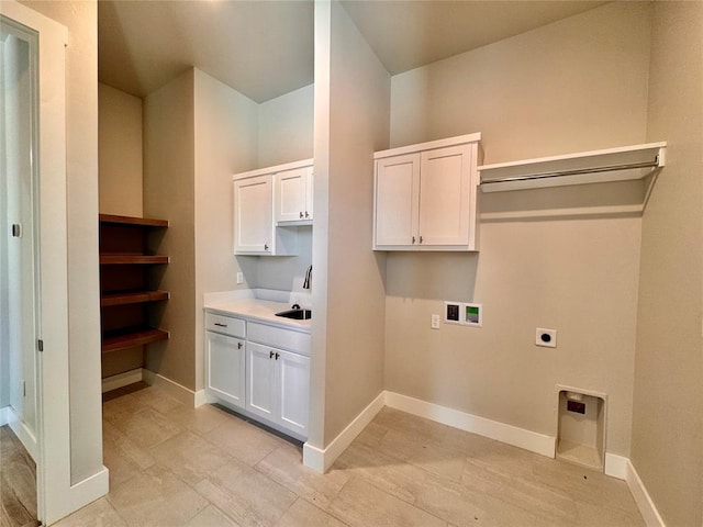 10132 NW 100th St, Yukon, OK 73099 - laundry room with hookup for an electric dryer, hookup for a washing machine, and cabinet space