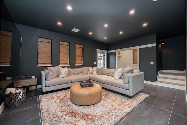 home theater with recessed lighting, dark tile patterned floors, visible vents, and baseboards