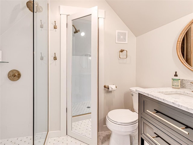 full bath featuring a shower stall, vaulted ceiling, visible vents, toilet, and vanity