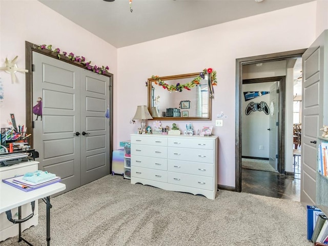 bedroom with a closet and carpet floors