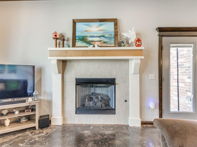 details featuring concrete flooring and a fireplace