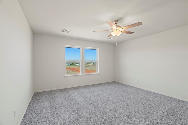 4605 Lincoln Lndg, Harrah, OK 73045 - empty room featuring carpet, a ceiling fan, and baseboards