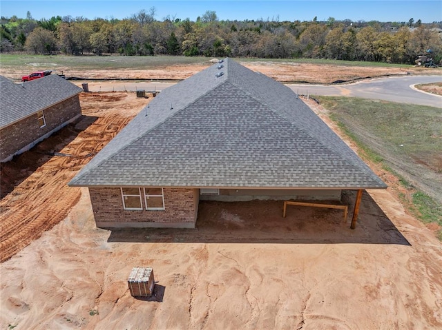 4605 Lincoln Lndg, Harrah, OK 73045 - view from above of property featuring a forest