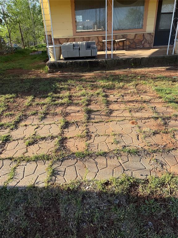 1709 Fisherman Rd, Carnegie, OK 73015 - view of yard featuring a patio area