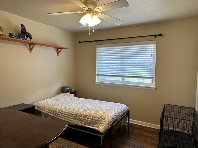 609 Utah Ave, Norman, OK 73069 - bedroom featuring wood finished floors, baseboards, and a ceiling fan