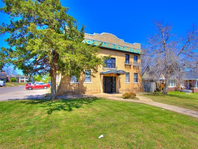225 NW 24th St, Oklahoma City, OK 73103 - view of front of property with a front yard
