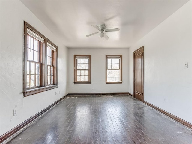225 NW 24th St, Oklahoma City, OK 73103 - empty room featuring a ceiling fan, baseboards, and dark wood-style floors