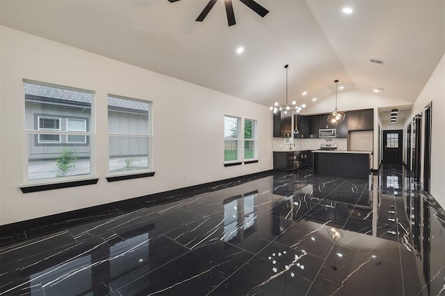 528 NW 112th St, Oklahoma City, OK 73114 - kitchen featuring stainless steel appliances, dark marble finish floors, a chandelier, a ceiling fan, and vaulted ceiling