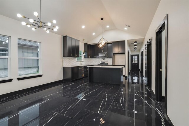 528 NW 112th St, Oklahoma City, OK 73114 - kitchen featuring stainless steel appliances, dark marble finish floors, vaulted ceiling, a center island, and a chandelier
