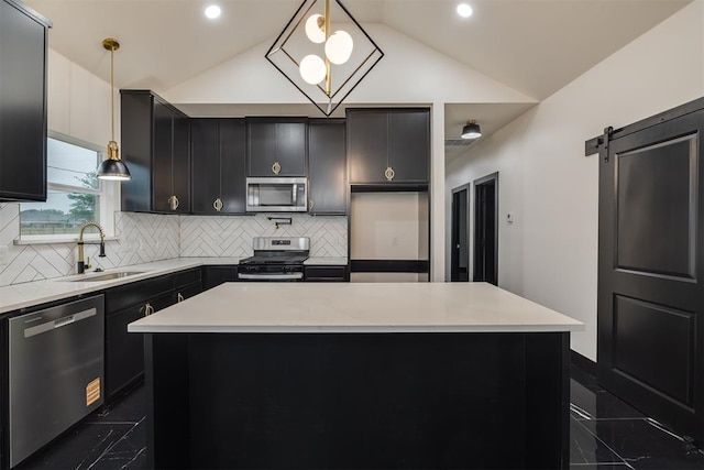 528 NW 112th St, Oklahoma City, OK 73114 - kitchen with stainless steel appliances, a sink, dark cabinetry, vaulted ceiling, and dark marble finish flooring