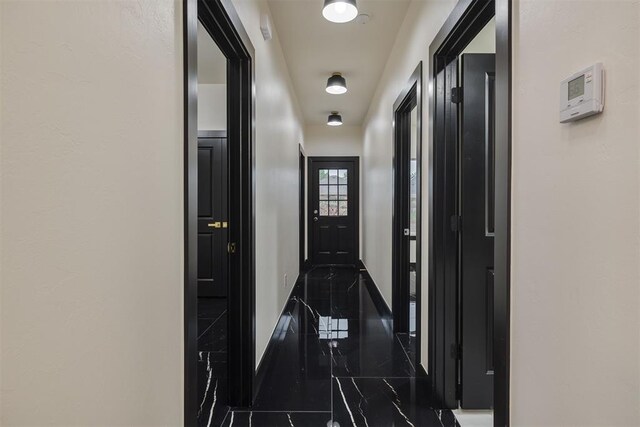 528 NW 112th St, Oklahoma City, OK 73114 - hallway with marble tiled flooring and baseboards