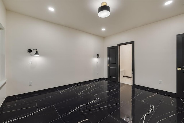 528 NW 112th St, Oklahoma City, OK 73114 - unfurnished room with dark marble finish flooring and recessed lighting