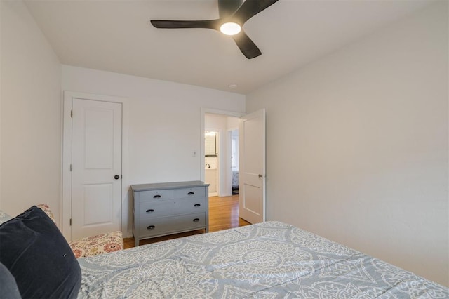 bedroom featuring wood finished floors and a ceiling fan