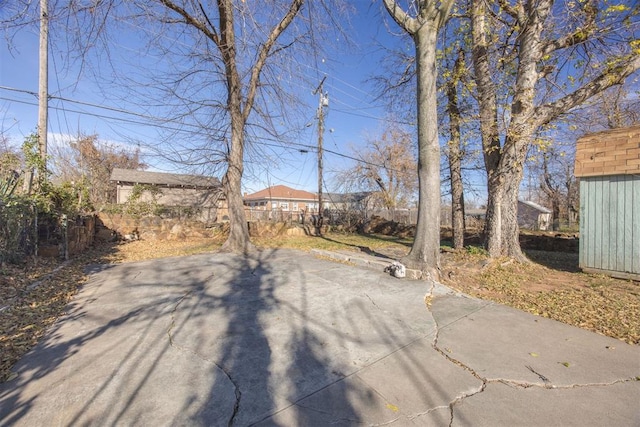 view of yard with a patio area and fence