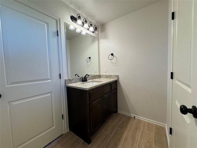 24947 Preakness Run, Cashion, OK 73016 - bathroom featuring wood finished floors and vanity