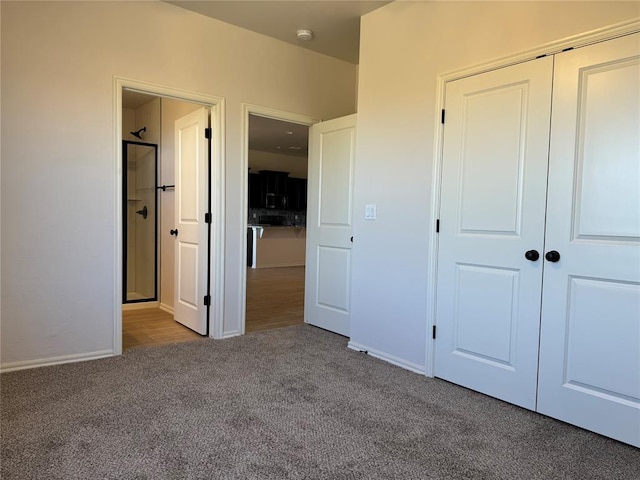 24947 Preakness Run, Cashion, OK 73016 - unfurnished bedroom featuring carpet flooring and a closet