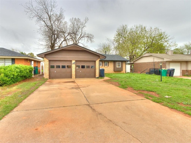 single story home with driveway, a front lawn, and brick siding