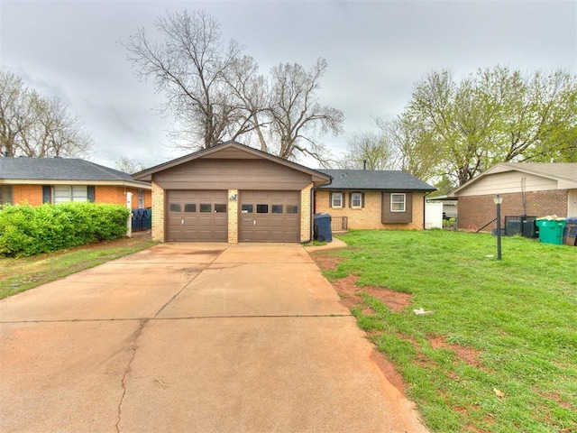 single story home with concrete driveway, a front yard, and brick siding