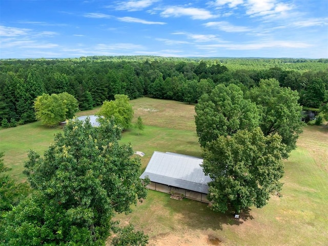 drone / aerial view with a view of trees