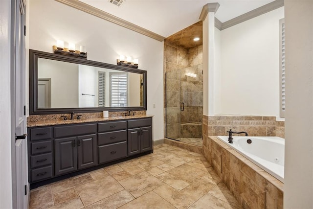 13125 Oakcliff Rd, Oklahoma City, OK 73120 - bathroom featuring a bath, a sink, crown molding, double vanity, and a stall shower