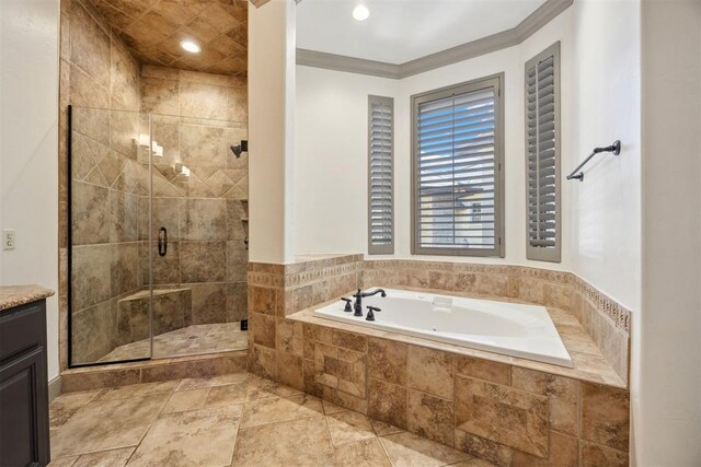 13125 Oakcliff Rd, Oklahoma City, OK 73120 - bathroom with ornamental molding, a shower stall, vanity, and a garden tub