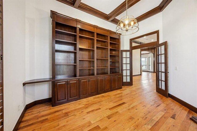 13125 Oakcliff Rd, Oklahoma City, OK 73120 - interior space featuring light wood-style floors, beamed ceiling, a chandelier, french doors, and baseboards