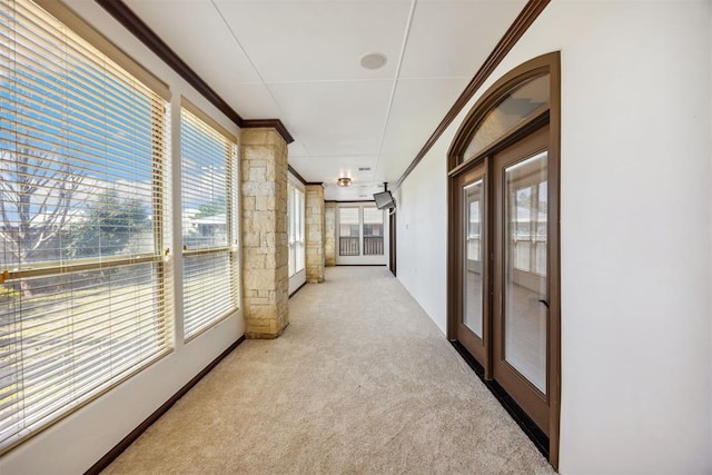 13125 Oakcliff Rd, Oklahoma City, OK 73120 - hallway with light colored carpet and ornamental molding