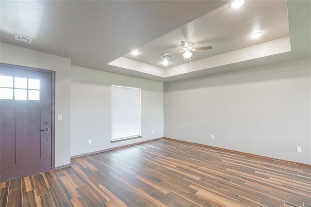 1800 N Nebraska Ave, Oklahoma City, OK 73111 - foyer entrance with a raised ceiling, wood finished floors, a ceiling fan, and visible vents