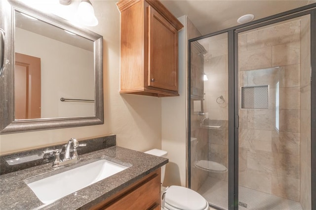 1800 N Nebraska Ave, Oklahoma City, OK 73111 - full bathroom featuring toilet, a stall shower, and vanity