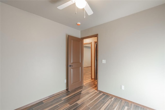 1800 N Nebraska Ave, Oklahoma City, OK 73111 - unfurnished room with light wood-style flooring, baseboards, and a ceiling fan