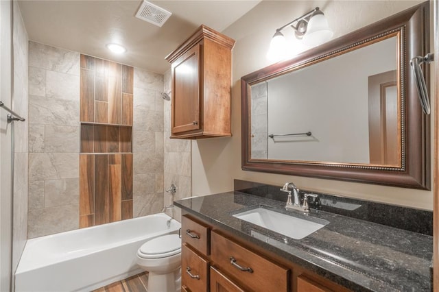 1800 N Nebraska Ave, Oklahoma City, OK 73111 - full bath with vanity, visible vents, toilet, and shower / washtub combination