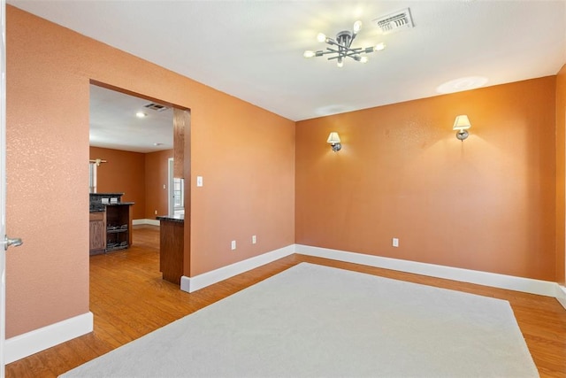 17787 N County Road 3200th Rd, Pauls Valley, OK 73075 - empty room featuring visible vents, baseboards, and wood finished floors