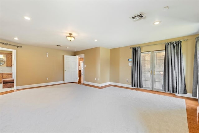 17787 N County Road 3200th Rd, Pauls Valley, OK 73075 - unfurnished room with light wood-type flooring, baseboards, visible vents, and recessed lighting