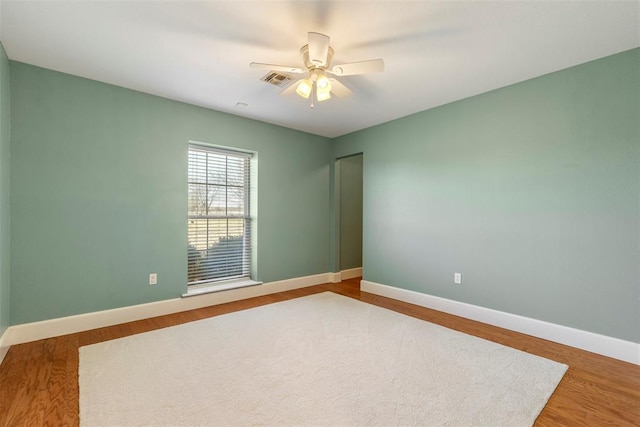 17787 N County Road 3200th Rd, Pauls Valley, OK 73075 - unfurnished room featuring visible vents, baseboards, ceiling fan, and wood finished floors