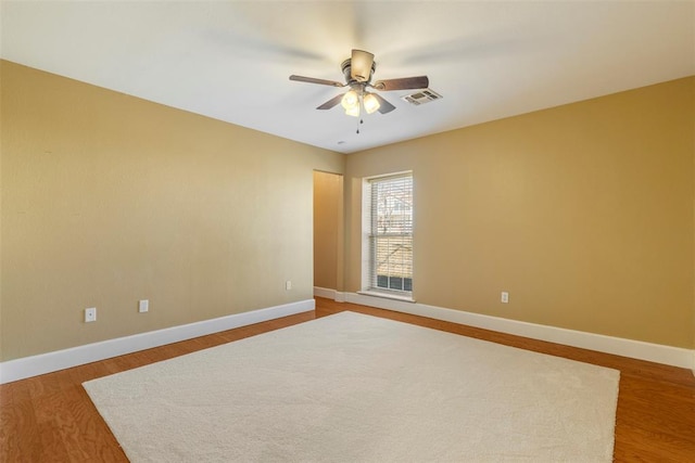 17787 N County Road 3200th Rd, Pauls Valley, OK 73075 - spare room with visible vents, baseboards, wood finished floors, and ceiling fan
