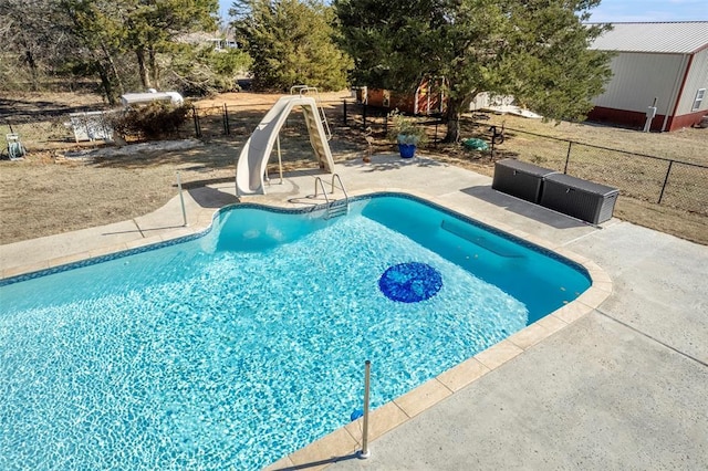 17787 N County Road 3200th Rd, Pauls Valley, OK 73075 - view of swimming pool with a fenced in pool, a patio area, a water slide, and fence
