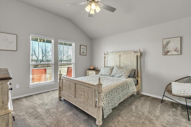 carpeted bedroom with vaulted ceiling, a ceiling fan, and baseboards
