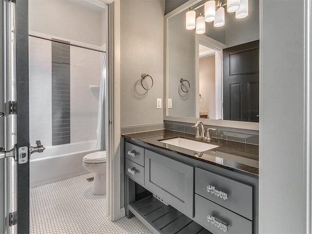 full bathroom with toilet, shower / bath combination with curtain, tile patterned flooring, and vanity