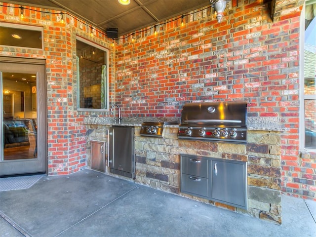view of patio / terrace with a grill and area for grilling